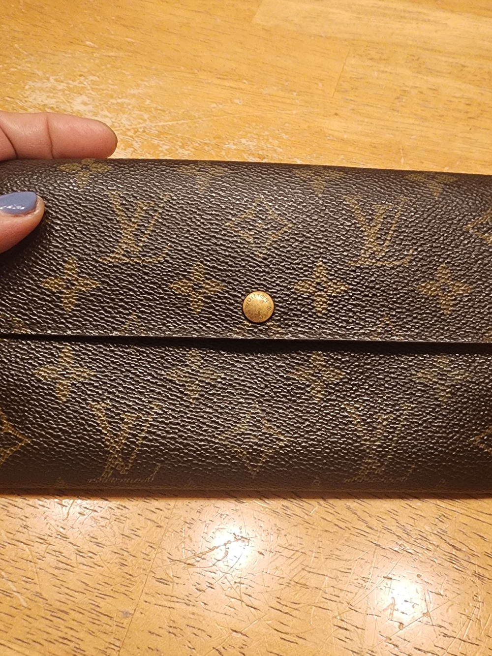 Louis Vuitton Sarah Long Wallet in traditional Monogram canvas
